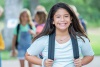 Middle school girl with her backpack ready for school