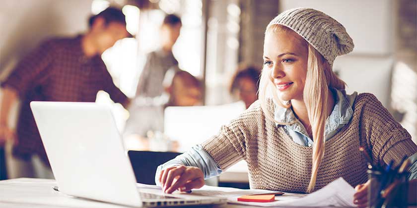 Woman using laptop.